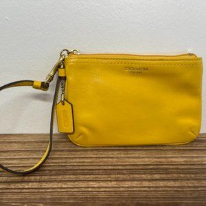Yellow leather Coach wristlet
